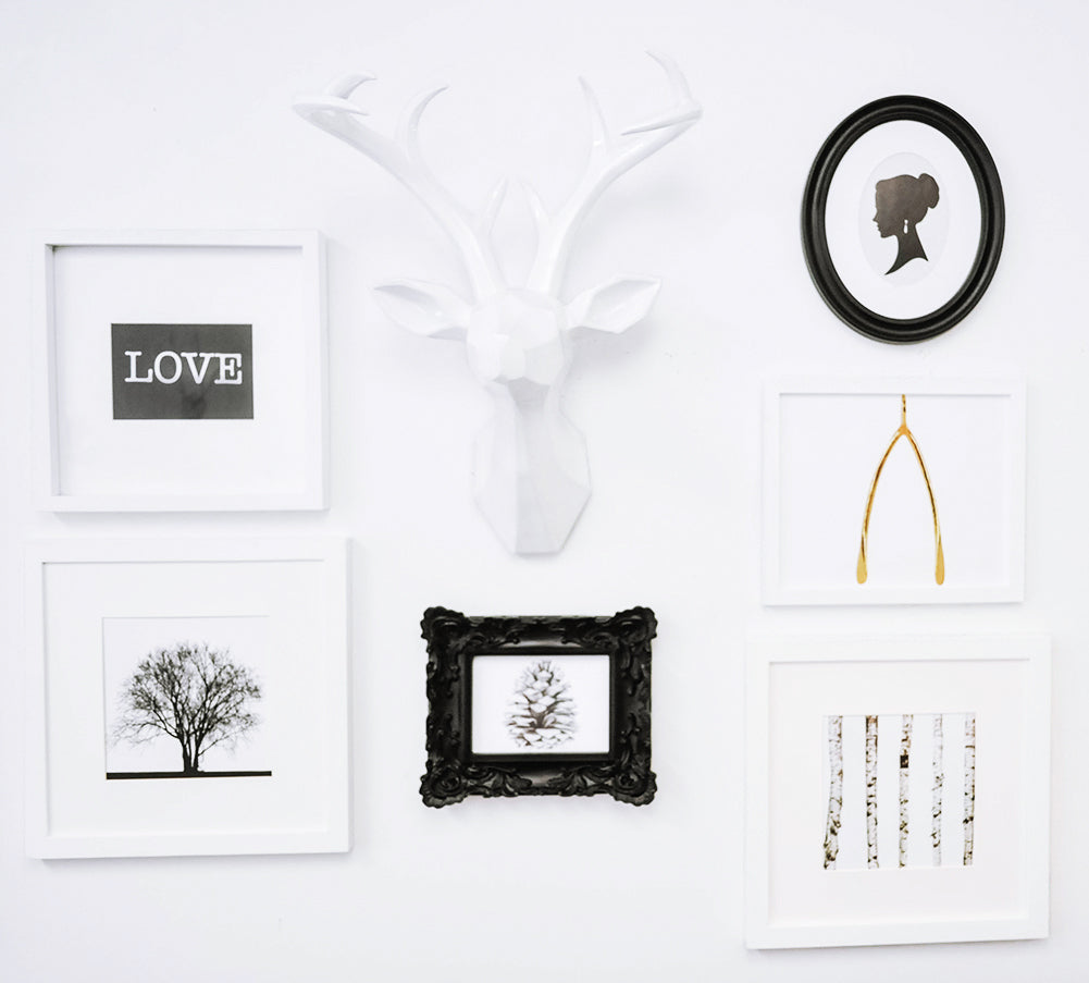 How To Hang Pictures Without Messing Up Your Walls